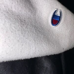 White champion hoodie with blue logo